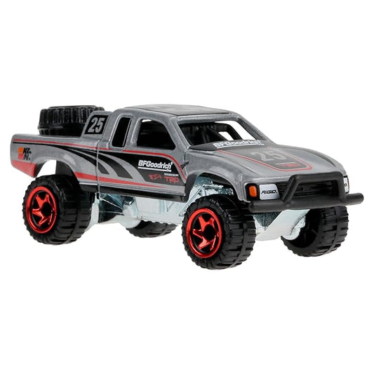 Hot Wheels Toy Truck, 1:64 Scale Die-Cast Toyota Vehicle Off Road Truck with Elevated Deco